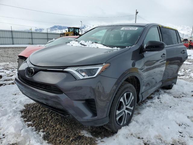 TOYOTA RAV4 LE 2018 with VIN 2T3BFREV9JW762014 - Photo from auction