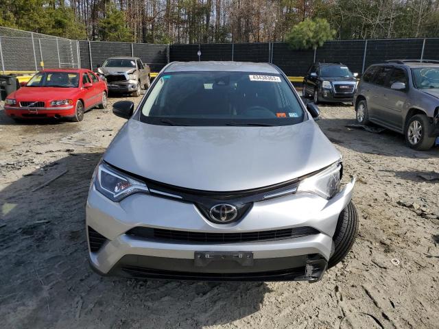 Photo 5 from auction – 2018 TOYOTA RAV4 LE with VIN JTMBFREV5JJ261247