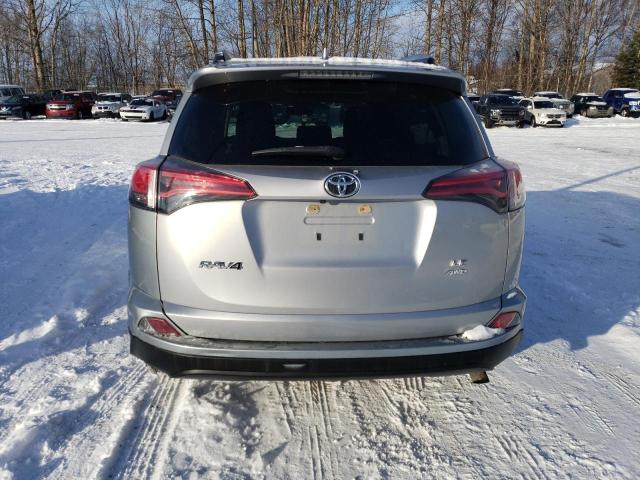 Photo 6 from auction – 2018 TOYOTA RAV4 LE with VIN JTMBFREV0JJ254805
