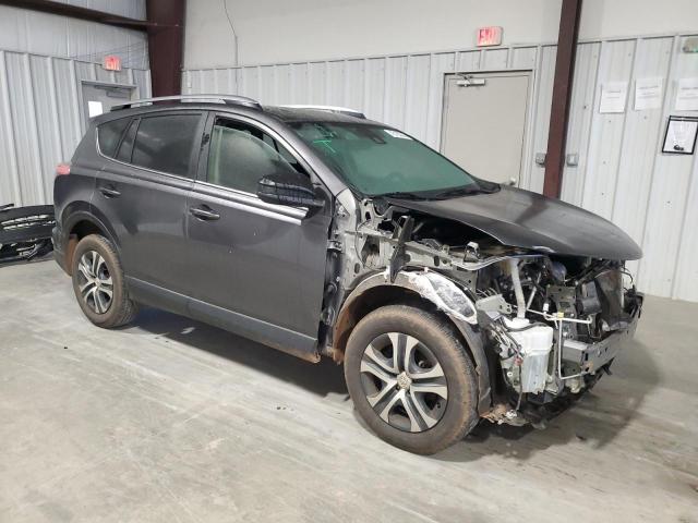 Photo 4 from auction – 2018 TOYOTA RAV4 LE with VIN JTMZFREV2JJ729059