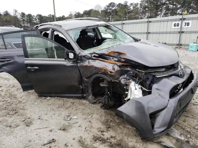 Photo 4 from auction – 2018 TOYOTA RAV4 LE with VIN JTMBFREV5HJ713417