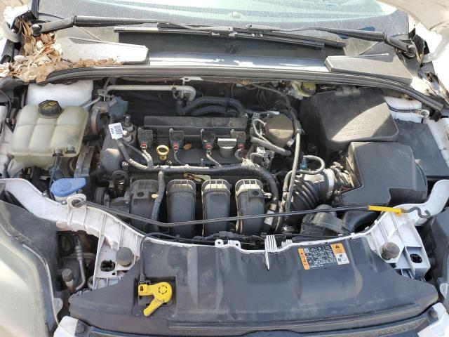 Photo 11 from auction – 2014 FORD FOCUS TITA with VIN 1FADP3N22EL279956