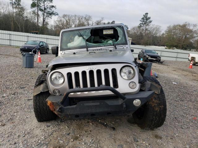 Photo 5 from auction – 2016 JEEP WRANGLER U with VIN 1C4BJWDG9GL242326