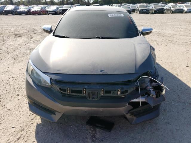 Photo 5 from auction – 2016 HONDA CIVIC LX with VIN 19XFC2F52GE033888