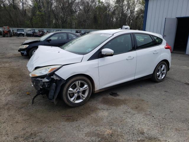 FORD FOCUS SE 2014 with VIN 1FADP3K2XEL400303 - Photo from auction