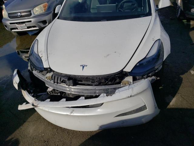 Photo 11 from auction – 2021 TESLA MODEL 3 with VIN 5YJ3E1EA3MF872041
