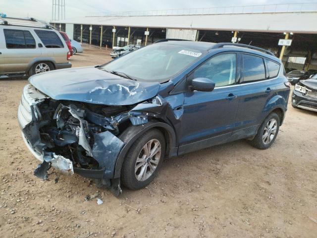 FORD ESCAPE SE 2018 with VIN 1FMCU0GDXJUB16211 - Photo from auction