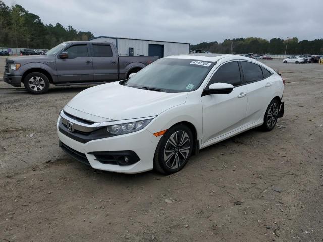 HONDA CIVIC EX 2018 with VIN JHMFC1F32JX016796 - Photo from auction