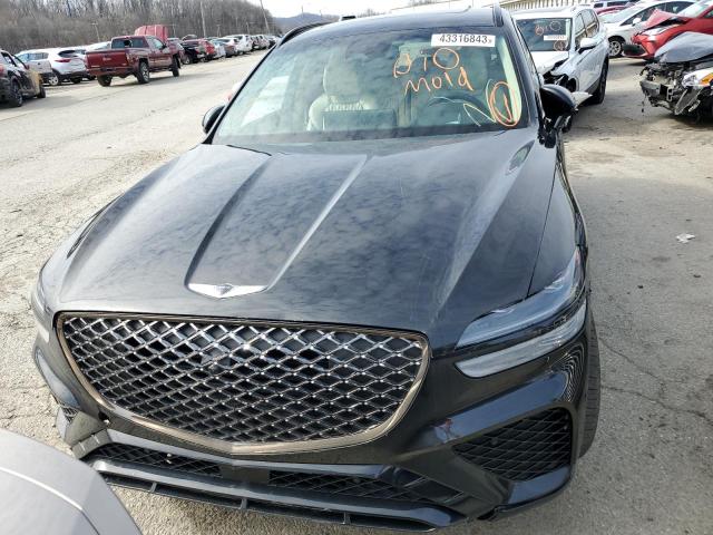 Photo 5 from auction – 2022 GENESIS GV70 BASE with VIN KMUMCDTC7NU042488