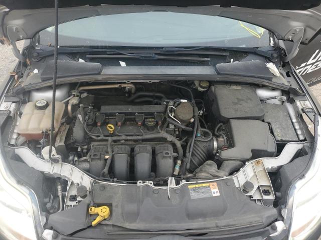 Photo 11 from auction – 2013 FORD FOCUS SE with VIN 1FADP3F28DL308695