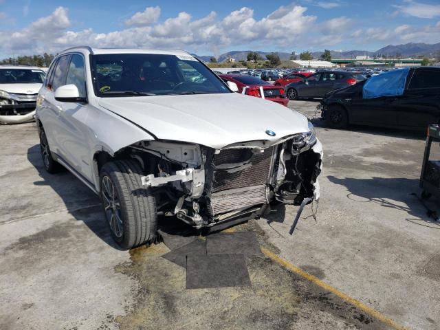 Photo 4 from auction – 2018 BMW X5 SDRIVE3 with VIN 5UXKR2C5XJ0Z16010