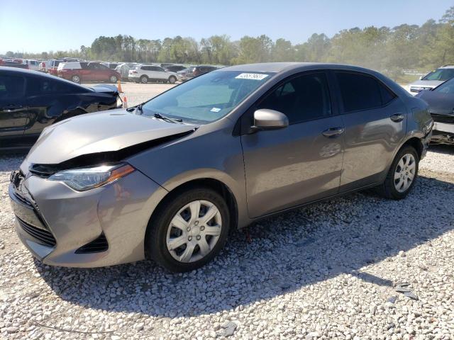 TOYOTA COROLLA L 2017 with VIN 5YFBURHE4HP677670 - Photo from auction