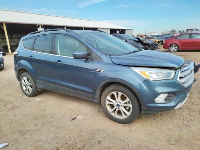 Photo 4 from auction – 2018 FORD ESCAPE SE with VIN 1FMCU0GDXJUB16211