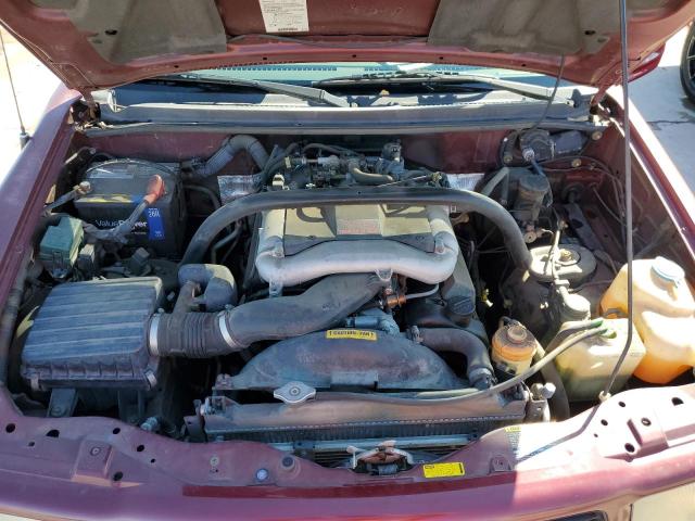 Photo 11 from auction – 2003 CHEVROLET TRACKER LT with VIN 2CNBE634136928533