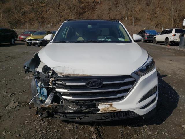 Photo 5 from auction – 2017 HYUNDAI TUCSON LIM with VIN KM8J3CA21HU567802