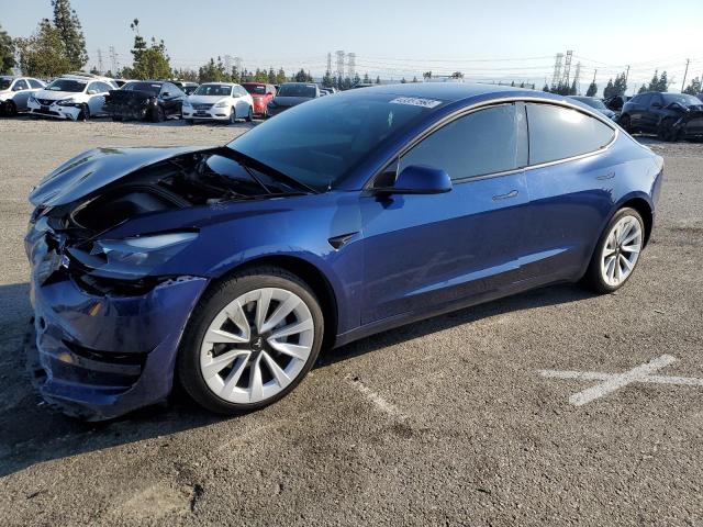 TESLA MODEL 3 2021 with VIN 5YJ3E1EA1MF876587 - Photo from auction