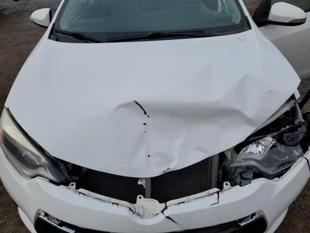 Photo 11 from auction – 2014 TOYOTA COROLLA L with VIN 2T1BURHEXEC064478