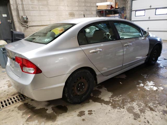 Photo 3 from auction – 2011 HONDA CIVIC LX with VIN 19XFA1F53BE040552