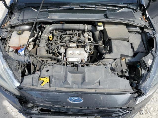 Photo 11 from auction – 2017 FORD FOCUS SE with VIN 1FADP3FE3HL276738