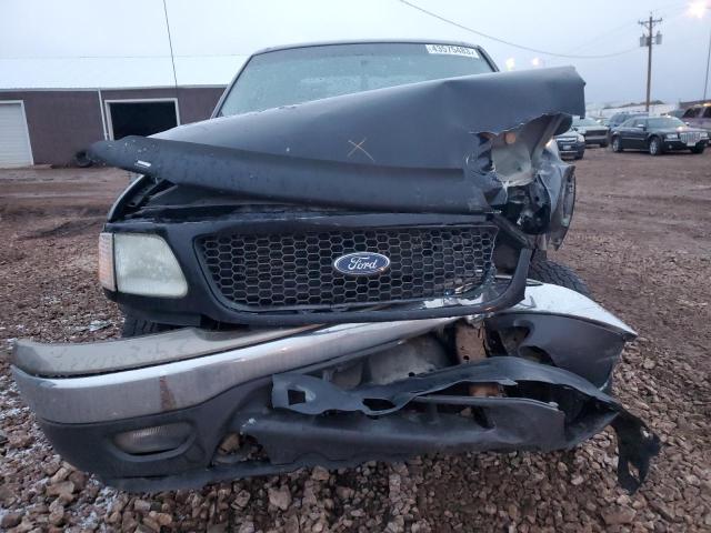 Photo 5 from auction – 2002 FORD F150 SUPER with VIN 1FTRW08L72KC24958