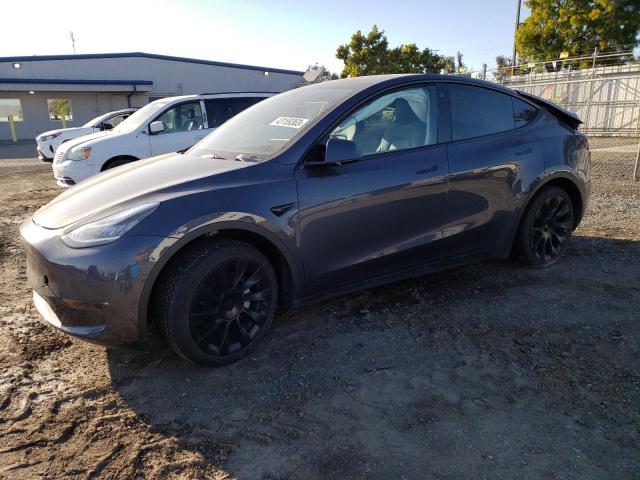TESLA MODEL Y 2022 with VIN 7SAYGAEE9NF340803 - Photo from auction