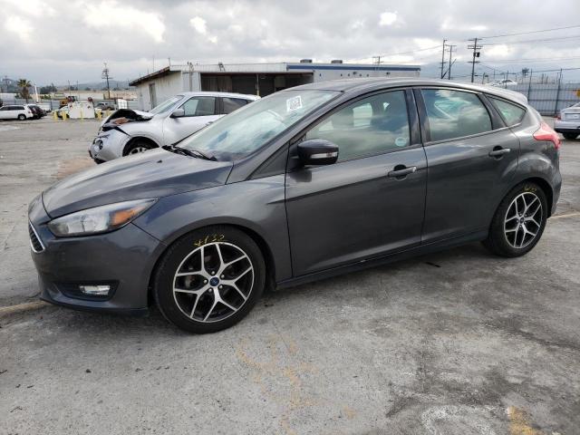 FORD FOCUS SEL 2017 with VIN 1FADP3M2XHL290418 - Photo from auction