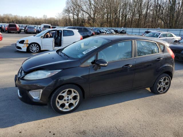 FORD FIESTA SES 2011 with VIN 3FADP4FJ9BM102472 - Photo from auction