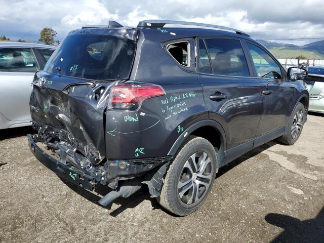 Photo 3 from auction – 2017 TOYOTA RAV4 LE with VIN JTMZFREV5HJ709933