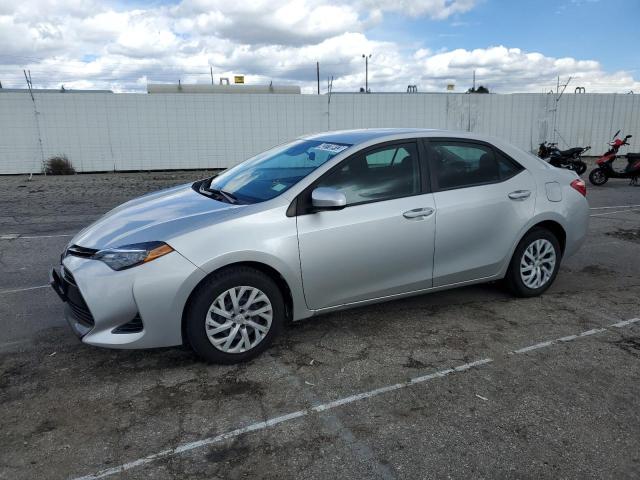 TOYOTA COROLLA L 2019 with VIN 5YFBURHE4KP884616 - Photo from auction
