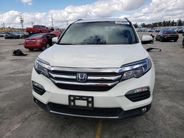 Photo 5 from auction – 2018 HONDA PILOT TOUR with VIN 5FNYF6H98JB063468