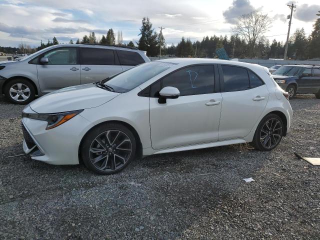 TOYOTA COROLLA SE 2019 with VIN JTNK4RBEXK3046149 - Photo from auction