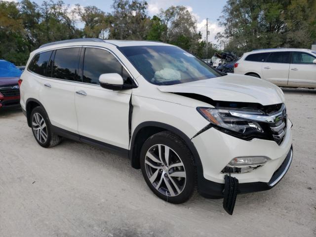 Photo 4 from auction – 2017 HONDA PILOT ELIT with VIN 5FNYF6H03HB104908