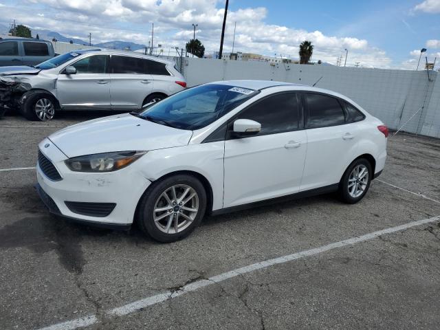FORD FOCUS SE 2016 with VIN 1FADP3F24GL221980 - Photo from auction