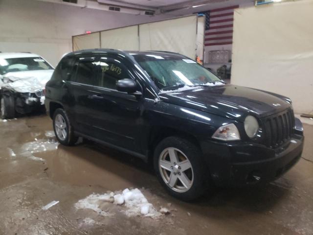 Photo 4 from auction – 2009 JEEP COMPASS with VIN 1J4FT47B59D110400