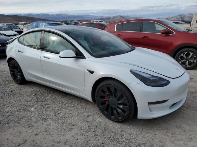 Photo 4 from auction – 2022 TESLA MODEL 3 with VIN 5YJ3E1ECXNF266772