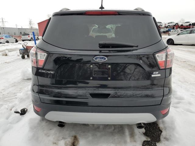 Photo 6 from auction – 2018 FORD ESCAPE SE with VIN 1FMCU0GD1JUC52985
