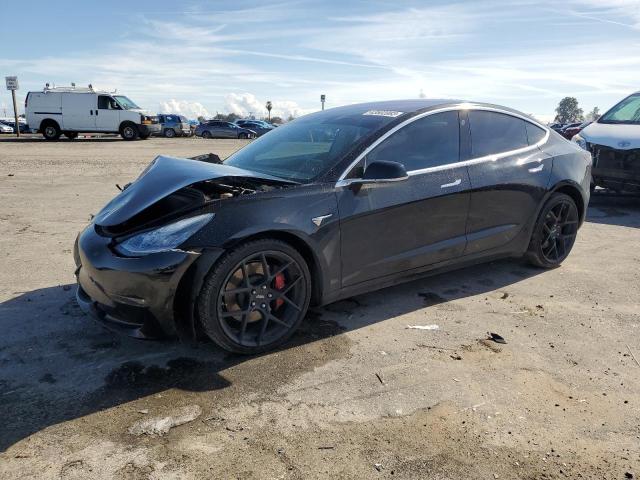 TESLA MODEL 3 2018 with VIN 5YJ3E1EB8JF180975 - Photo from auction