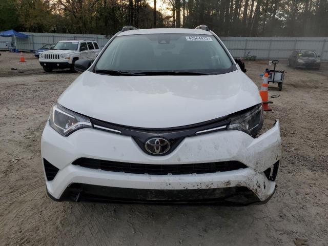 Photo 5 from auction – 2018 TOYOTA RAV4 LE with VIN 2T3ZFREV3JW505798