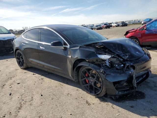 Photo 4 from auction – 2018 TESLA MODEL 3 with VIN 5YJ3E1EB8JF180975