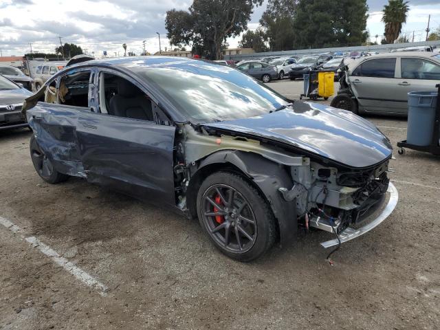 Photo 4 from auction – 2022 TESLA MODEL 3 with VIN 5YJ3E1ECXNF321768
