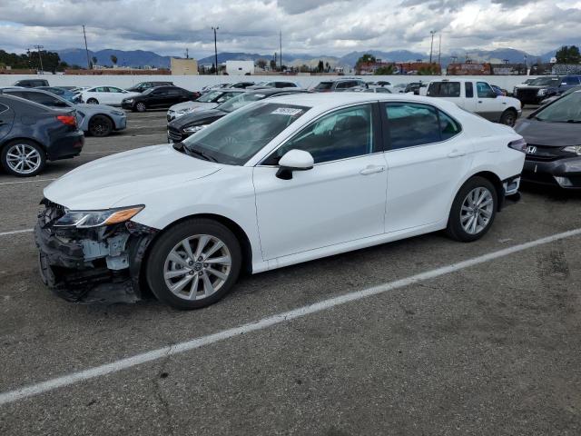 TOYOTA CAMRY LE 2022 with VIN 4T1C11AK2NU644837 - Photo from auction