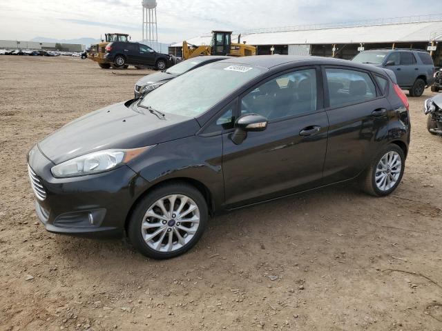 FORD FIESTA SE 2014 with VIN 3FADP4EJ9EM136594 - Photo from auction