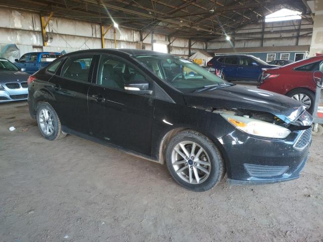 Photo 4 from auction – 2015 FORD FOCUS with VIN 1FADP3F2XFL329812