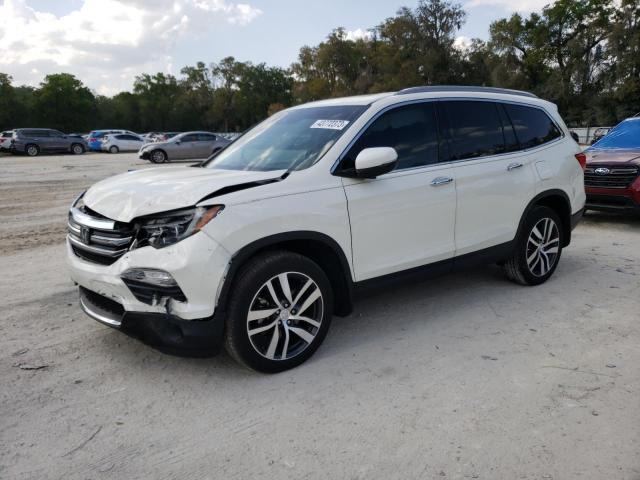 HONDA PILOT ELIT 2017 with VIN 5FNYF6H03HB104908 - Photo from auction