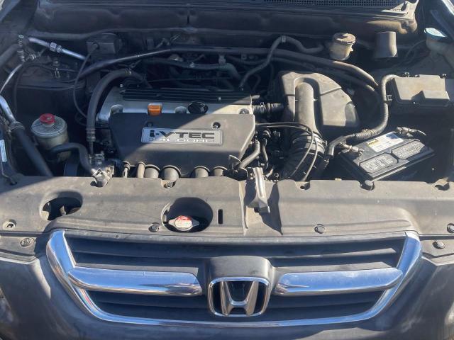 Photo 7 from auction – 2002 HONDA CR-V LX with VIN JHLRD68412C002835