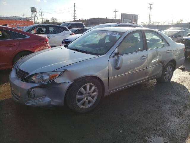 TOYOTA CAMRY LE 2002 with VIN JTDBF30K120034848 - Photo from auction