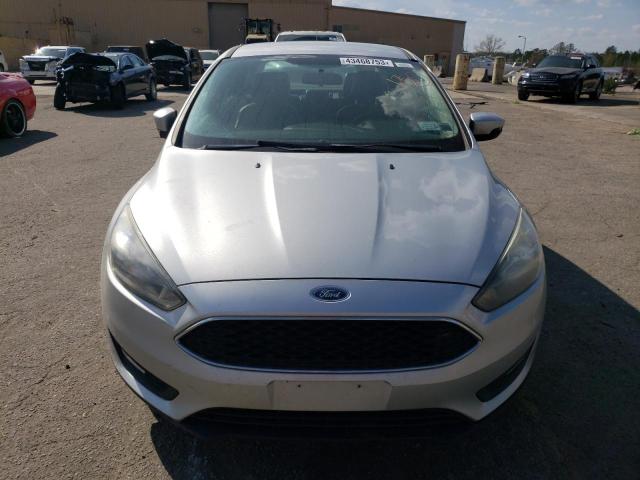Photo 5 from auction – 2016 FORD FOCUS SE with VIN 1FADP3F20GL321171