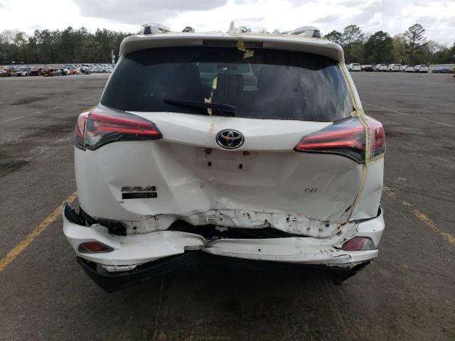 Photo 6 from auction – 2018 TOYOTA RAV4 LE with VIN 2T3ZFREV3JW482300