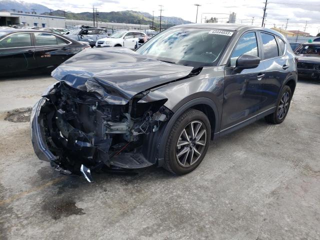 MAZDA CX-5 TOURI 2018 with VIN JM3KFACM1J0410469 - Photo from auction