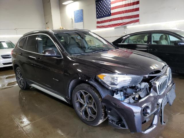 Photo 4 from auction – 2016 BMW X1 XDRIVE2 with VIN WBXHT3C3XG5E48248